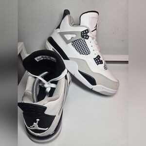 Air Jordan 4 Retro "White Cement" sneakers. 